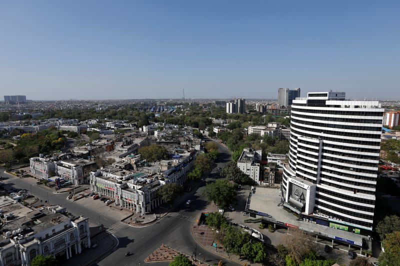 FILE PHOTO: Buildings are pictured after air pollution level started to drop in New Delhi