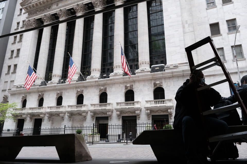 NEW YORK, NEW YORK - MAY 11: People walk by the New York Stock Exchange after global stocks fell as concerns mount that rising inflation will prompt central banks to tighten monetary policy on May 11, 2021 in New York City. By mid afternoon the tech-heavy Nasdaq Composite had lost 0.6% after falling 2.2% at its session low.  (Photo by Spencer Platt/Getty Images)