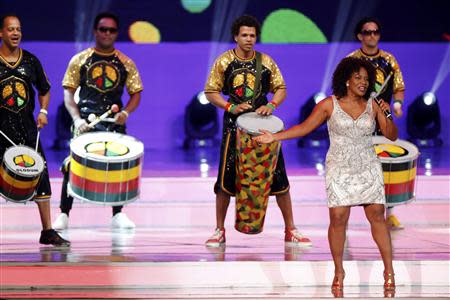 Brazilian singer Margareth Menezes performs with percussion group Olodum during the draw for the 2014 World Cup at the Costa do Sauipe resort in Sao Joao da Mata, Bahia state, December 6, 2013. REUTERS/Sergio Moraes