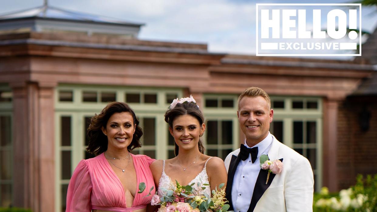 Kym Marsh is proud as she stands with newlyweds Emilie and Mikey