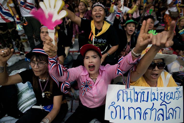 Thai opposition protesters hold an anti-government rally in Bangkok on November 11, 2013