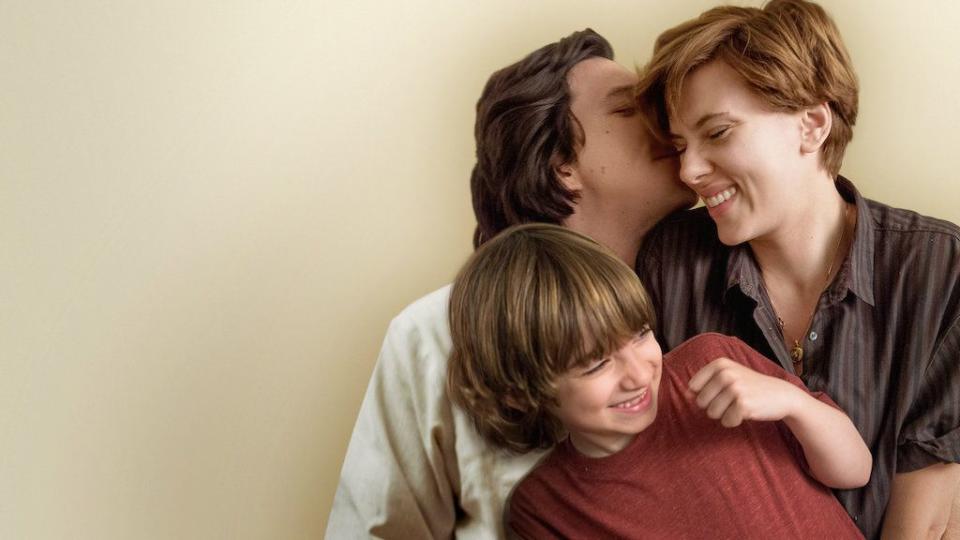 two parents share a kiss while a child cringes in a scene from marriage story, a good housekeeping pick for best sad movies on netflix