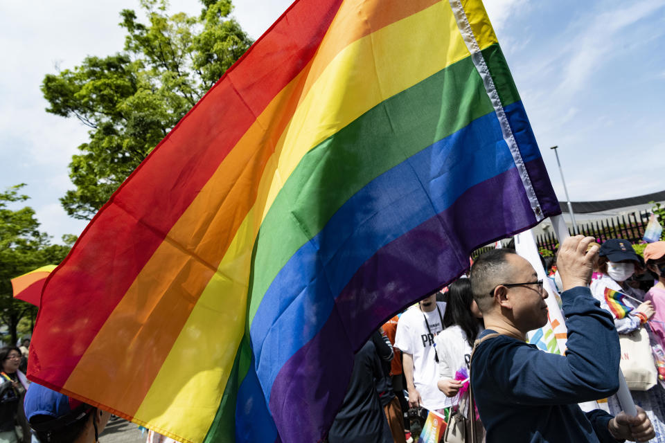 A participant carries a rainbow flag during the Pride parade in Tokyo, Japan, in a file photo from April 2023. / Credit: Yusuke Harada/NurPhoto/Getty