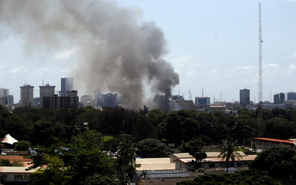 Smoke rises from the Nigeria Correctional service facility in Lagos - Sunday Alamba /AP