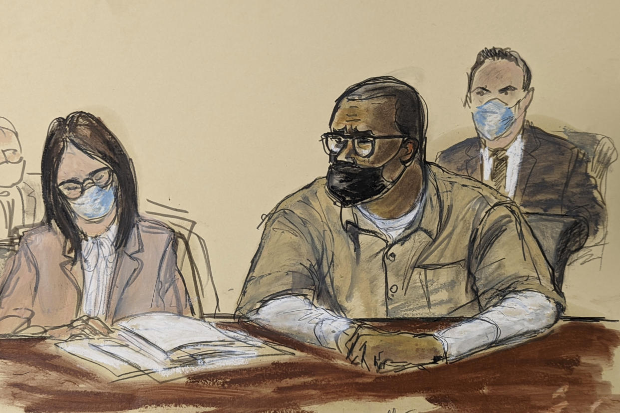 In this courtroom sketch, R. Kelly and his attorney Jennifer Bonjean, left, appear during his sentencing hearing in federal court, Wednesday, June 29, 2022, in New York. The former R&B superstar was convicted of racketeering and other crimes. (AP Photo/Elizabeth Williams)