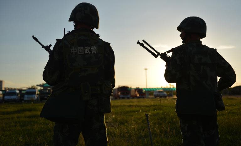 File photo of Chinese police conducting an anti-terrorism drill in Hami, Xinjiang region, where rights groups and analysts accuse Beijing of cultural and religious repression against the mostly Muslim Uighur minority
