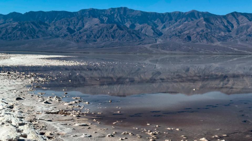 PHOTO: Heavy rain from last August's tropical storm Hilary contributes to the formation of a lake not seen in years at Bad Water Basin, Dec. 15, 2023, near Furnace Creek, Calif., Death Valley National Park. (George Rose/Getty Images)