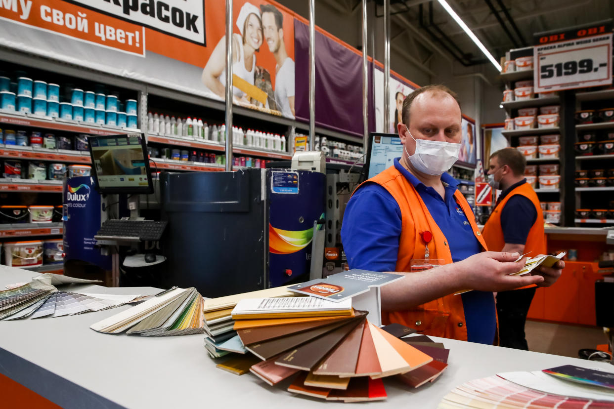 MOSCOW, RUSSIA - MARCH 25, 2020: Workers in face masks in an OBI hypermarket during the pandemic of the novel coronavirus (COVID-19). As of 25 March 2020, Russia has confirmed more than 600 cases of the novel coronavirus, with more than 400 cases in Moscow. Sergei Fadeichev/TASS (Photo by Sergei Fadeichev\TASS via Getty Images)