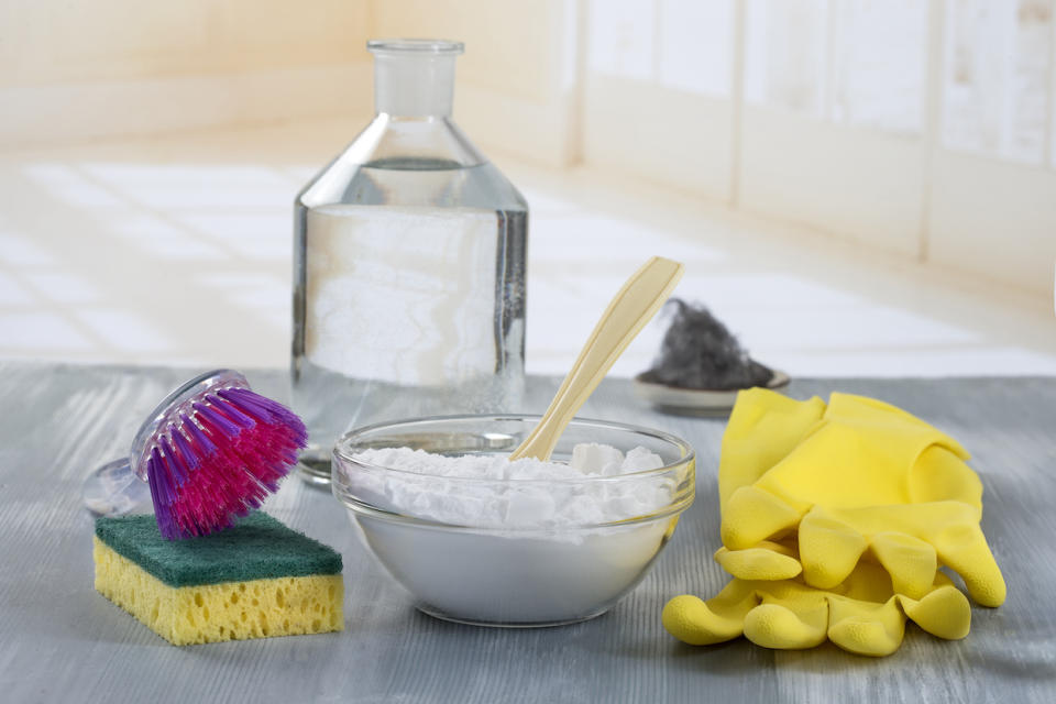 baking soda, cleaning gloves, vinegar and sponge