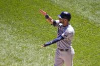 Tampa Bay Rays' Kevin Kiermaier celebrates as he waits for Mike Zunino at home after scoring on Zunino's two-run home run during the seventh inning of a baseball game Wednesday, June 16, 2021, in Chicago. (AP Photo/Charles Rex Arbogast)