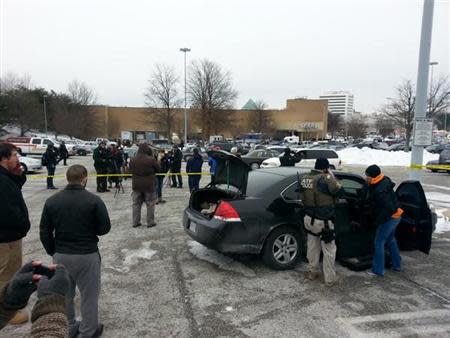 Members of the media gathers for a press conference at mall in Columbia, Maryland, January 25, 2014. REUTERS/DCMediagroup/Robert Brune