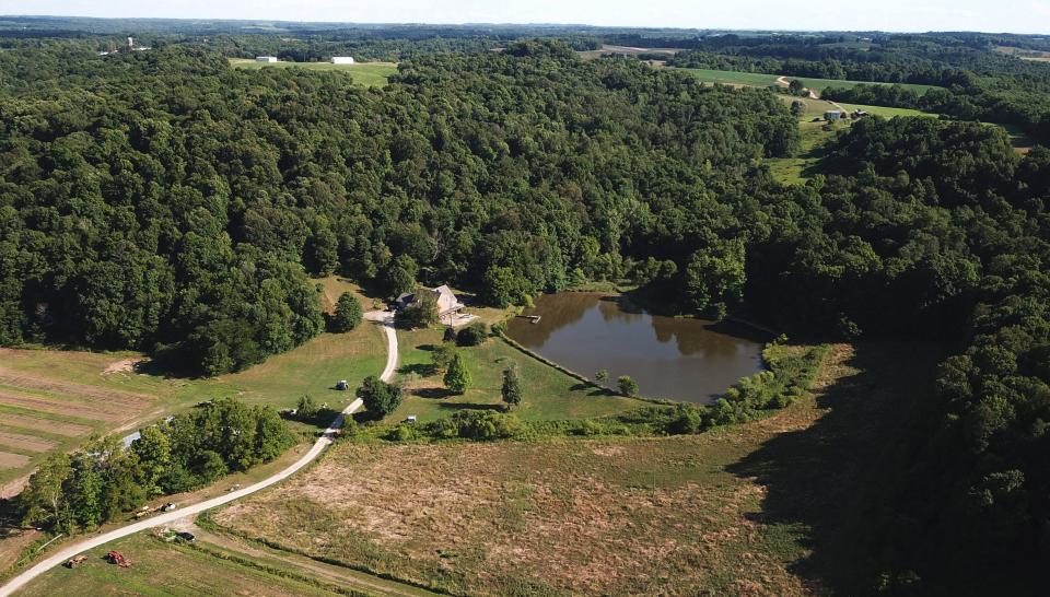 Larry Householder’s Perry County farm, pictured July 27, 2020, features a long driveway leading to his home, a greenhouse and a large pond.