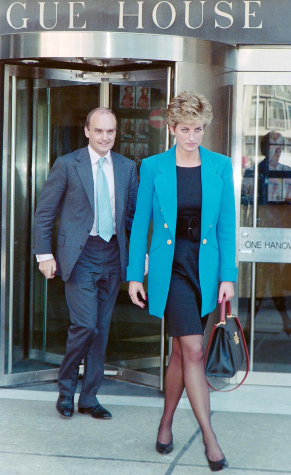 Sir Nicholas Coleridge and Princess Diana leave the Vogue House offices in 1994 (News Group Newspapers/News Licensing)