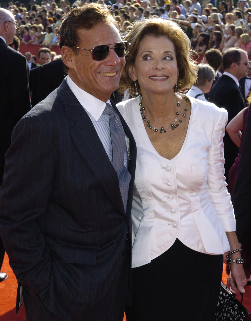 FILE - This Sept. 18, 2005 file photo shows Ron Leibman, left, with his wife Jessica Walter at the 57th Annual Primetime Emmy Awards in Los Angeles. Leibman, who appeared in movies, theater and television in a career that spanned six decades and won a Tony for Tony Kushner's iconic play ”Angels in America," has died after an illness at age 82. Leibman's agent, Robert Attermann, said the actor died Friday, Dec. 6, 2019. (AP Photo/Chris Pizzello, File)