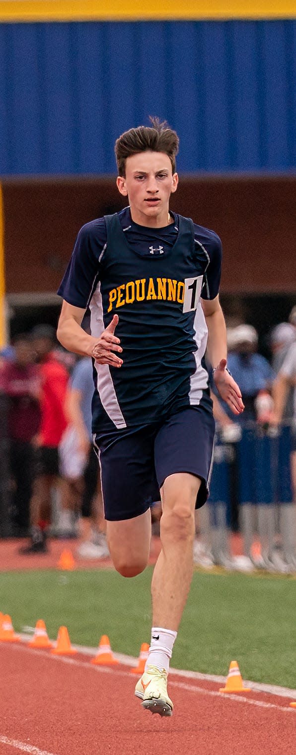 Pequannock's Ryan Trocolar runs in the boys 200 meter dash at the NJSIAA Groups 2 & 4 Track and Field Championships on June 10, 2022 at Franklin High School.