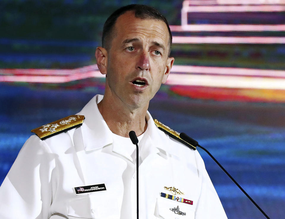FILE - In this May 5, 2019 file photo, U.S. Chief of Naval Operations Adm. John Richardson delivers a speech during the International Maritime Security Conference on the sidelines of the International Maritime Defense Exhibition in Singapore. Richardson is scheduled to visit the U.S. Naval War College in Newport, R.I., on Wednesday, June 12, 2019, just days after the president of the college was removed from his post. (AP Photo/Yong Teck Lim, File)