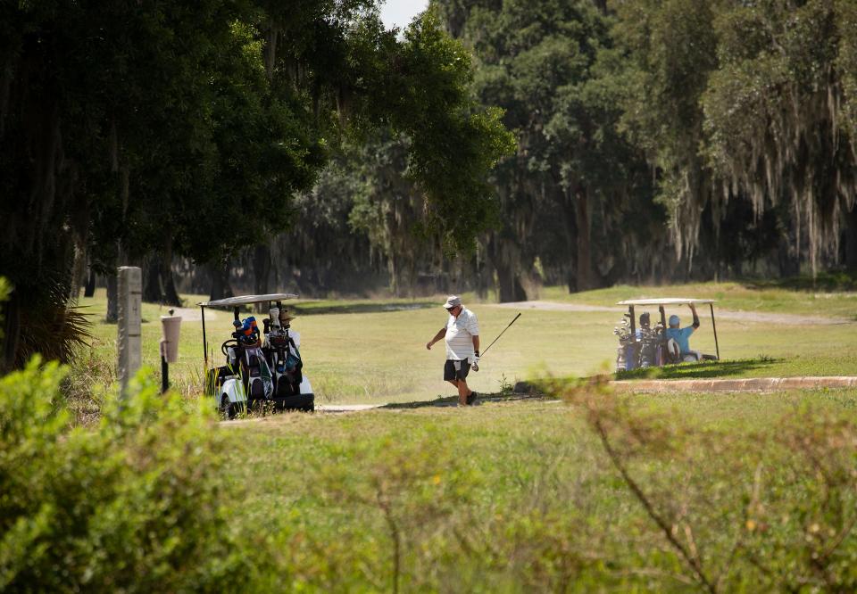 Golfers play a round on the ImperialLakes golf course in Lakeland Fl. The golf course in question has since been shut down, but after commissioners rejected a land use change for 62 acres of the 188-acre property, the future of the land is unclear.