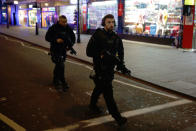 <p>Armed policemen walk down Oxford Street in central London on Nov. 24, 2017, as police responded to an incident. (Photo: Daniel Leal-Olivas/AFP/Getty Images) </p>