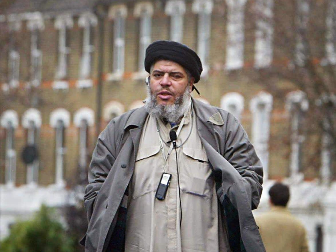  Imam Abu Hamza al-Masri addresses followers during Friday prayer in near Finsbury Park mosque in north London, in this 26 March 2004 file photo (ODD ANDERSEN/AFP via Getty Images)