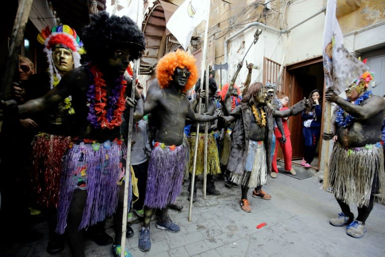 Lebanese take part in the Zambo carnival held in the northern city of Tripoli to mark the last period of excess on the eve of Orthodox Christian period of Lent