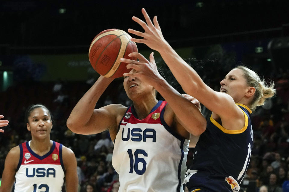 United States' Brionna Jones battles past Bosnia and Herzegovina's Nikolina Delic, right, during their game at the women's Basketball World Cup in Sydney, Australia, Tuesday, Sept. 27, 2022. (AP Photo/Mark Baker)