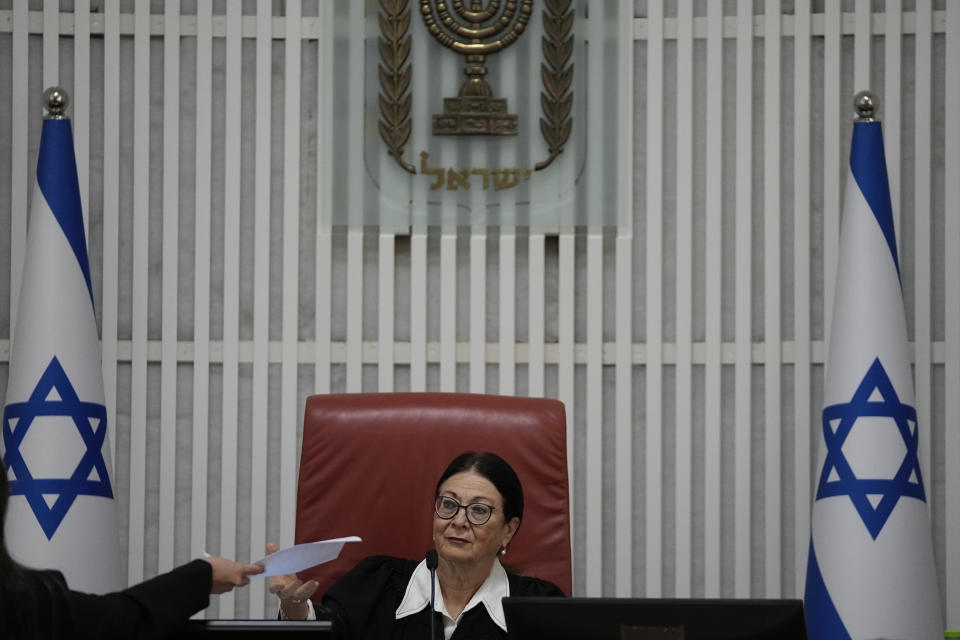 Esther Hayut, chief justice of the Supreme Court of Israel, sits on the bench during a hearing on a petition against a law that limits removal of a prime minister from office to medical and mental incapacitation, which makes forcing Prime Minister Benjamin Netanyahu from office over a conflict of interest while on trial for corruption more difficult, in Jerusalem, Thursday, Aug. 3, 2023. (AP Photo/Ohad Zwigenberg)