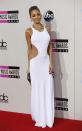 Nicole Richie has gained a reputation for taking risks on the red carpet, but this slim white dress with the too-large side cutouts doesn’t flatter the slender fashionista’s boyish figure at all. From the shoulders up, Richie looks good, but the rest of the dress seems ill-fitting. REUTERS/Mario Anzuoni (UNITED STATES - TAGS: ENTERTAINMENT)(AMA-ARRIVALS)