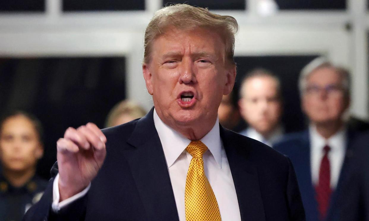 <span>Donald Trump speaks to reporters at Manhattan criminal court, on 21 May, in New York. He is estimated to have spent more than $100m on lawyers and other legal costs.</span><span>Photograph: Michael M Santiago/AP</span>