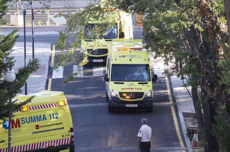 Ambulances carrying Roman Catholic priest Miguel Pajares, who contracted the deadly Ebola virus, and Spanish nun Juliana Bonoha Bohe arrive at the Carlos III hospital in Madrid on August 7, 2014