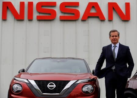 Nissan's European Chairman Gianluca de Ficchy poses for a photograph next to a new Juke car outside the company's car plant in Sunderland Britain