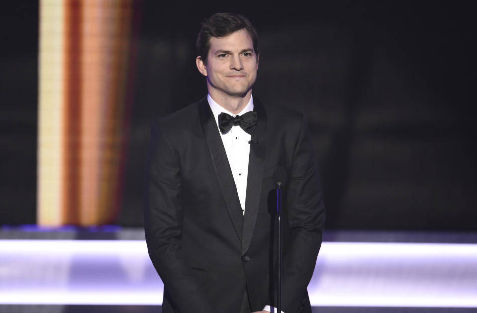 FILE - Ashton Kutcher presents the award for outstanding performance by a female actor in a comedy series at the 23rd annual Screen Actors Guild Awards at the Shrine Auditorium & Expo Hall on Sunday, Jan. 29, 2017, in Los Angeles. Kutcher turns 44 on Feb. 7. (Photo by Chris Pizzello/Invision/AP, File)