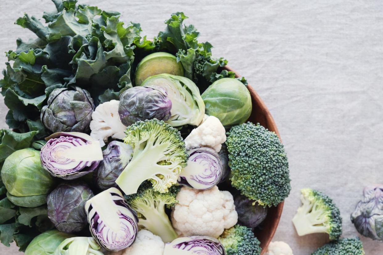 cruciferous vegetables, cauliflower,broccoli, brussels sprouts, kale in wooden bowl, reducing estrogen dominance, ketogenic diet