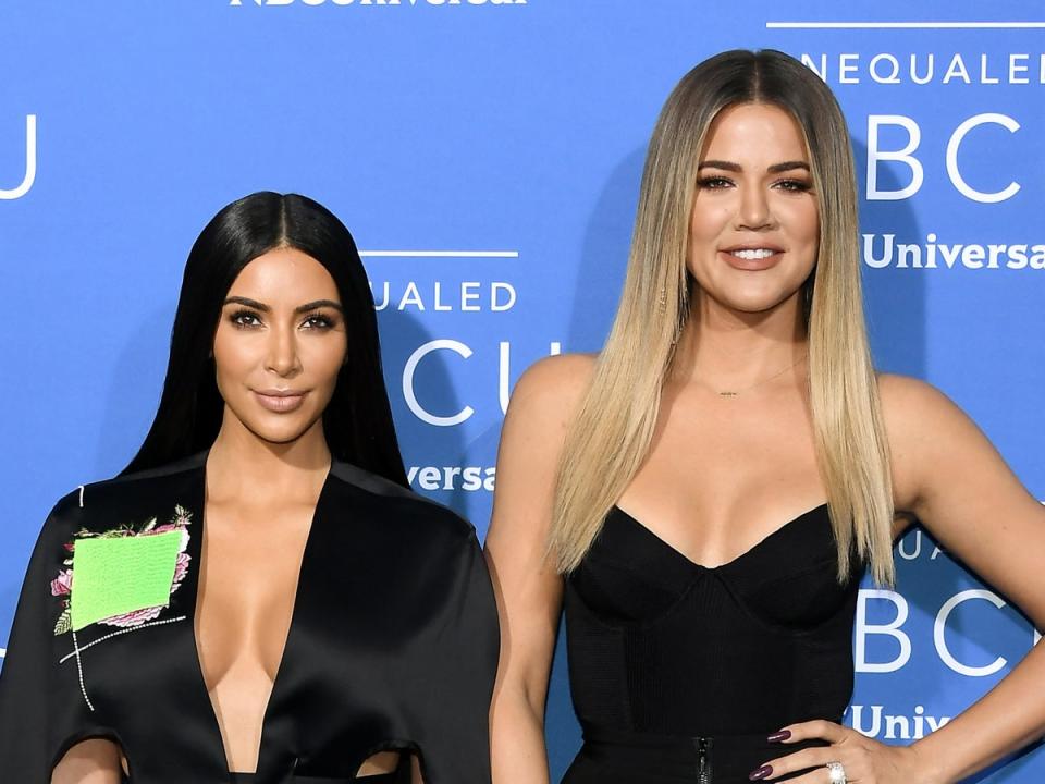 Kim Kardashian, left,  and Khloe Kardashian. Trump allegedly called Khloe a ‘fat piglet’ on the set of The Apprentice, and said he felt betrayed by Kim after she celebrated Joe Biden’s election victory in 2020 (Getty Images)