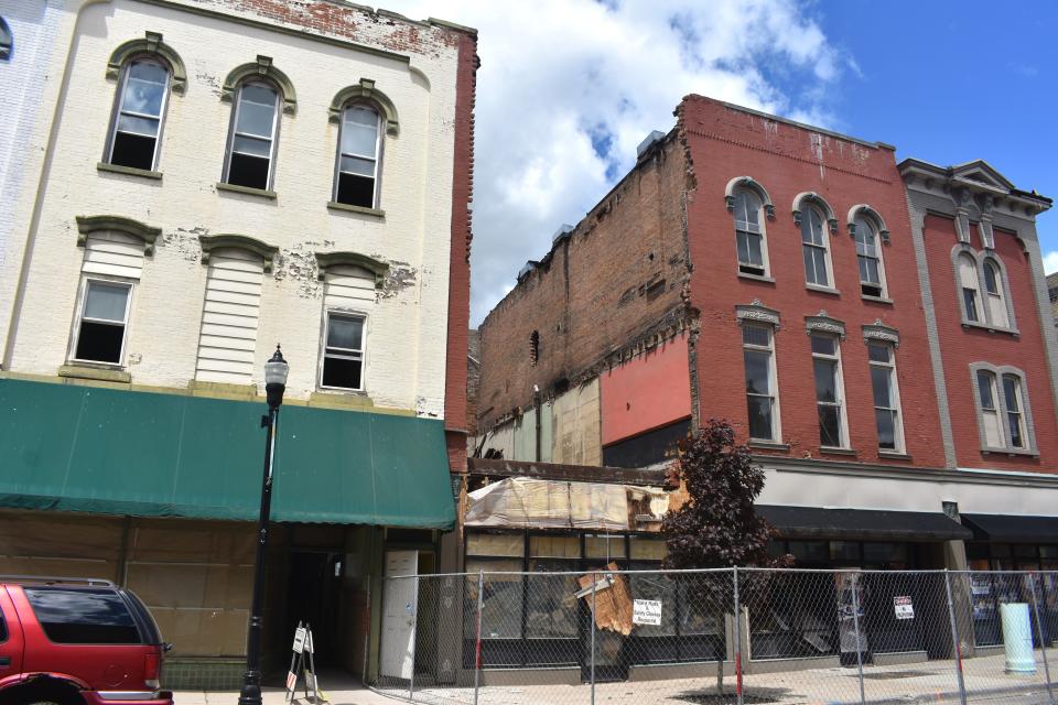 Demolition of three buildings in downtown Adrian was underway Friday and was scheduled to continue at least through Monday, May 13. The structures at 116, 118 and 120 S. Main St. were deemed blighted by the city.