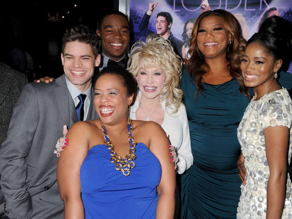 A group photo of Jeremy Jordan, Angela Grovey, Dexter Darden, Dolly Parton, Queen Latifah, Keke Palmer, and DeQuina Moore.