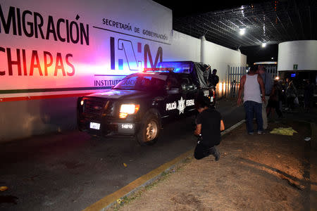 A police truck leaves the Siglo XXI immigrant detention center after a large group of Cubans, Haitians and Central Americans broke out and escaped the facilities, in Tapachula, Mexico April 25, 2019. REUTERS/Jose Torres