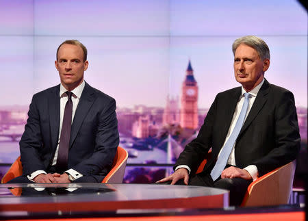 Philip Hammond MP, Chancellor of the Exchequer and Dominic Raab MP, former Brexit Secretary appear on BBC TV's The Andrew Marr Show in London, Britain, May 26, 2019. Jeff Overs/BBC/Handout via REUTERS
