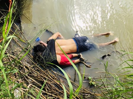 The bodies of a Salvadorian migrant and his daughter are seen at the Rio Bravo river in Matamoros