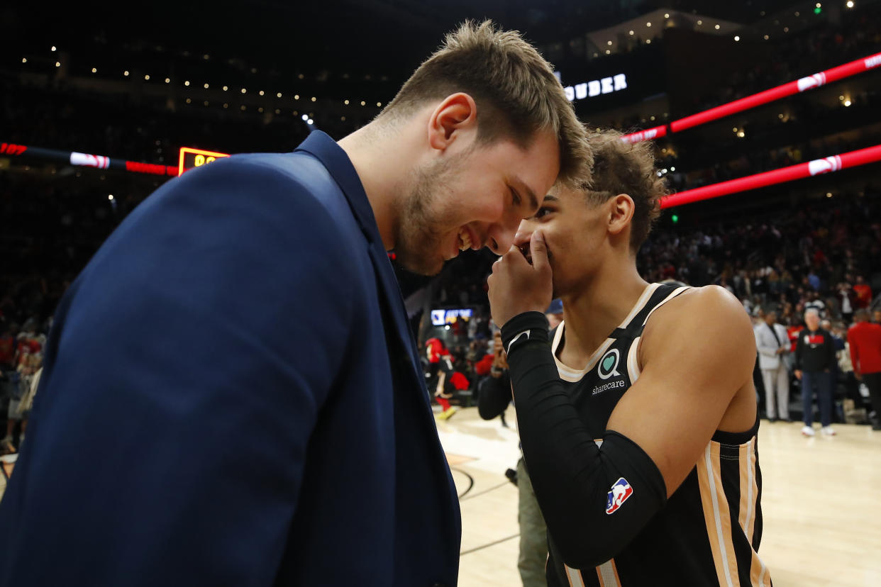 Luka Doncic and Trae Young both got their money, regardless of how you feel about the 2018 NBA draft order. (Todd Kirkland/Getty Images)