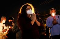 People attend a vigil for cinematographer Halyna Hutchins, who was fatally shot on the film set of "Rust", in Burbank