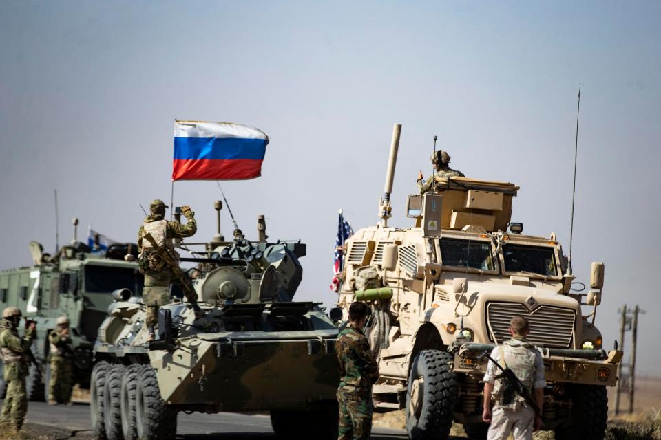 US and Russian armored vehicles side by side