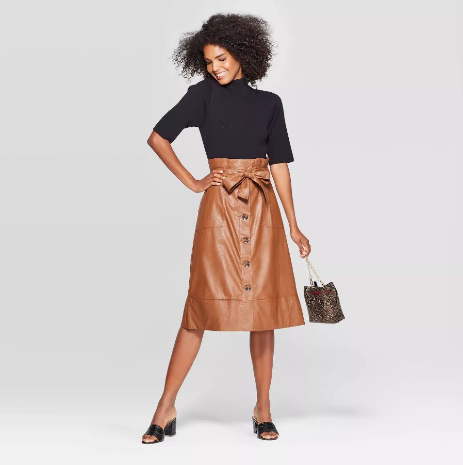 Leather is a pretty typical fabric for fall, but we're predicting you'll see more leather skirts, dresses and trousers for fall and winter 2019. From leather button-up skirts to <strong><a href="https://fave.co/2ZQsu6n" target="_blank" rel="noopener noreferrer">leather pinafores</a>&nbsp;</strong>and&nbsp;<strong><a href="https://fave.co/2N9w1Xh" target="_blank" rel="noopener noreferrer">wide-leg leather trousers</a></strong> that'll look stunning paired with a turtleneck, expect to wear leather on more than just our feet and shoulders this fall. (Pictured: <strong><a href="https://fave.co/2MYng2j" target="_blank" rel="noopener noreferrer">Target's A-Line Paperbag Midi Skirt</a></strong>)