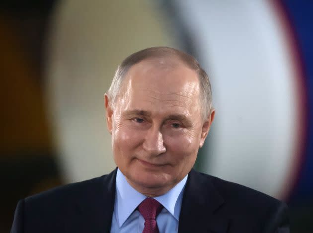 Russian President Vladimir Putin attends a meeting with workers at the AO Konar plant, a few minutes after his spokesman Dmitry Peskov said that President Putin had been informed about Alexey Navalny's death, on February 16, 2024 in Moscow, Russia. (Photo by Contributor/Getty Images)