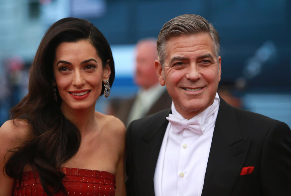 U.S. actor George Clooney arrives with his wife, Lebanese-British lawyer Amal Ramzi Clooney, for the Metropolitan Museum of Art Costume Institute Gala 2015 celebrating the opening of "China: Through the Looking Glass," in Manhattan, New York May 4, 2015.&nbsp;