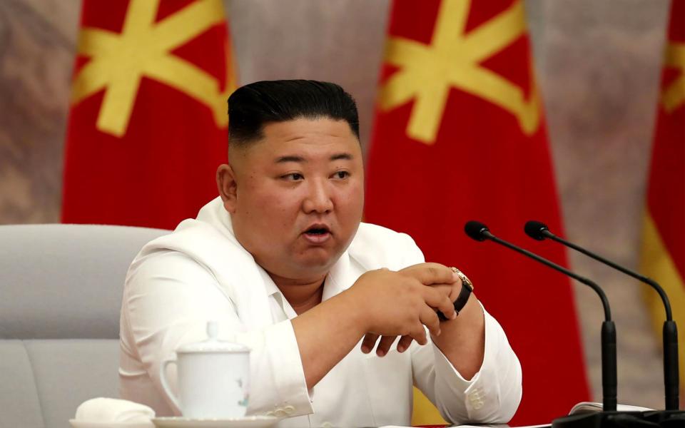 North Korean leader Kim Jong Un speaks during the Political Bureau of the Central Committee of the Workers' Party of Korea (WPK) meeting in Pyongyang. - STR/AFP