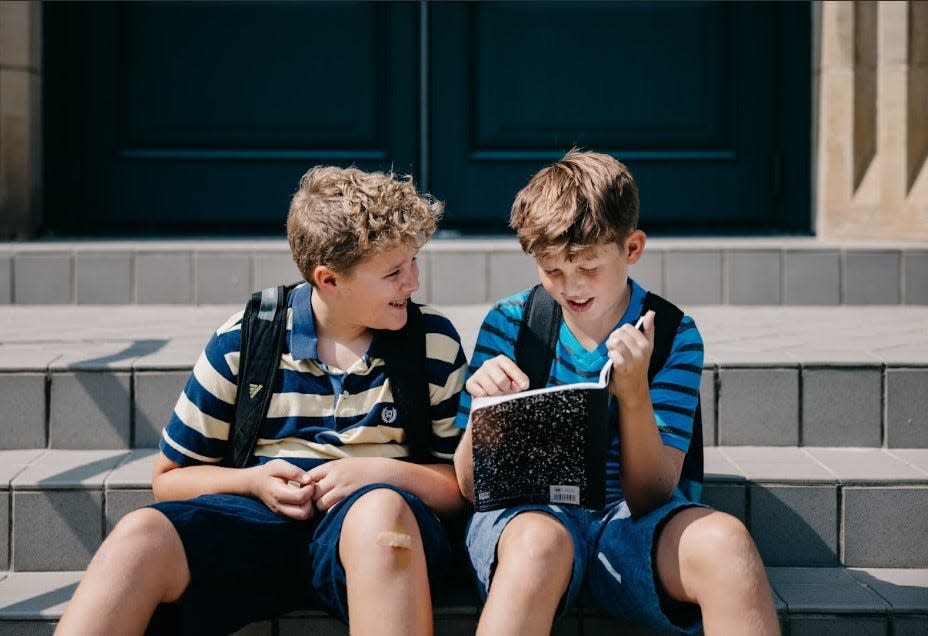 Harrison Strader, left, plays Rowley Jefferson alongside main character Greg Heffley, played by Isaac Rittberger, in the Columbus Children's Theatre production of "Diary of a Wimpy Kid: The Musical."