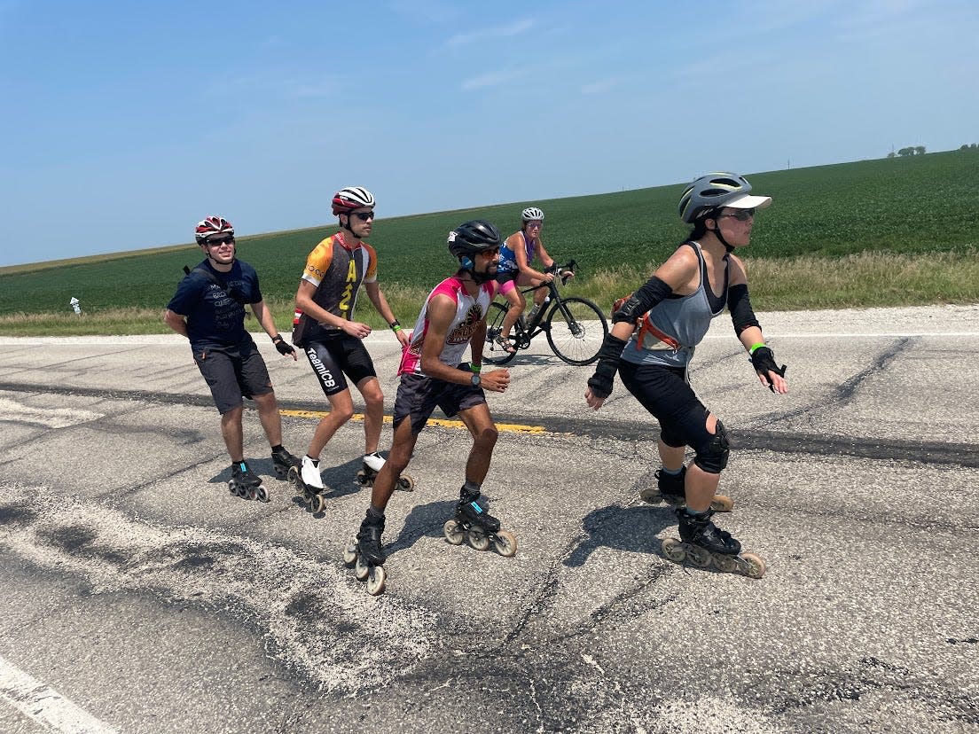 From left, Daniel Rosen, Kent Sutherland, Arnav "Sonic" Shah and Jen Shyu, on the road on Day 1 of RAGBRAI in 2021.