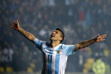 Argentina's Sergio Aguero celebrates after scoring a goal against Paraguay during their Copa America 2015 semi-final soccer match at Estadio Municipal Alcaldesa Ester Roa Rebolledo in Concepcion, Chile, June 30, 2015. REUTERS/Andres Stapff -