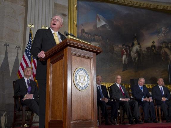 Apollo 11 Commander Neil Armstrong speaks to Congress at a ceremony that honored fellow astronauts John Glenn, Buzz Aldrin and Michael Collins. Each received a Congressional Gold Medals during the ceremony in the Capitol Rotunda on Nov. 16, 201