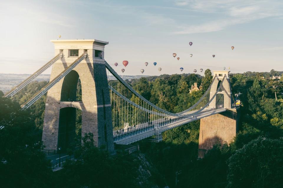 Ascend at sunrise to see the sky light up over the Clifton Suspension Bridge (Photo by Nathan Riley on Unsplash)